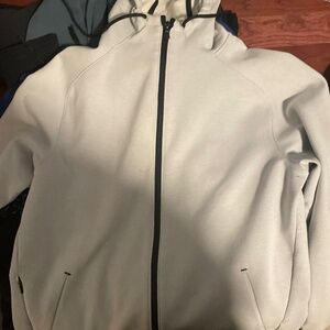A smooth white zip up hoodie